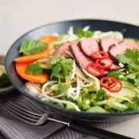 Thai Chili Beef Salad · Grilled Beef, Baby Bok Choy, Bean Sprouts, Daikon, Carrots, Cucumber, Snow Peas, Lime, Cilan...
