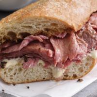 Prime Rib Sandwich · There's nothing like our Prime Rib Sandwich. Roasted in-house, thinly slice Rotisserie Prime...