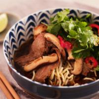 Chile Beef Ramen · Sauteed Beef, Bean Sprouts, Shitake Mushroom, Red Onion, Cilantro, Lime with Ramen Noodles a...