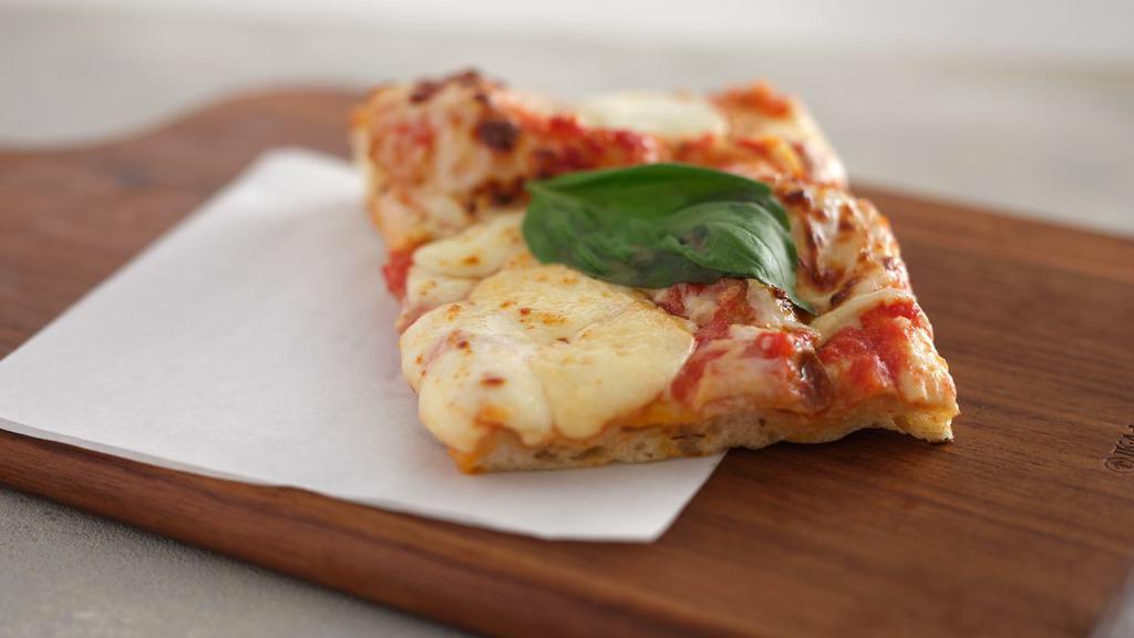 Margherita Pizza Slice · Fresh Mozzarella and Fresh Basil.