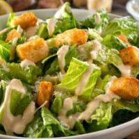 Caesar Salad · Crisp romaine, topped with house croutons and fresh
shredded parmigiano-reggiano with your c...