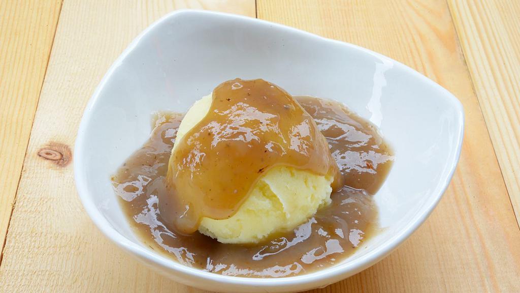 Mashed & Gravy · Fresh cooked potatoes mashed with butter and real brown gravy.