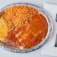 Enchiladas Chipotle · Two corn enchiladas (chicken, beef, or cheese) topped with cheese and our salsa chipotle.