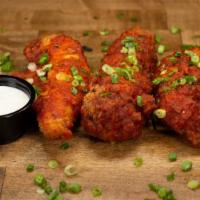 Tenders - Buffalo · 3 crispy fried chicken tenders with buffalo sauce, scallions. Comes with a side sauce of you...