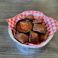 Toasted Ravioli · Breaded fresh in-house, lightly fried and served with a. side of Marinara or Ranch Dressing