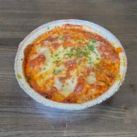 Pasta Al Forno · Our in-house favorite! A mixture of rigatoni & fusili noodles. with Meat Sauce, Mozzarella, ...