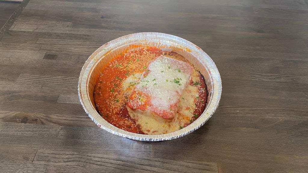 Cheese Lasagna · Layered sheet noodles filled with Ricotta, Mozzarella and. Romano Cheeses, fresh Herbs and Spcies & covered with your. choice of Marinara or Meat Sauce