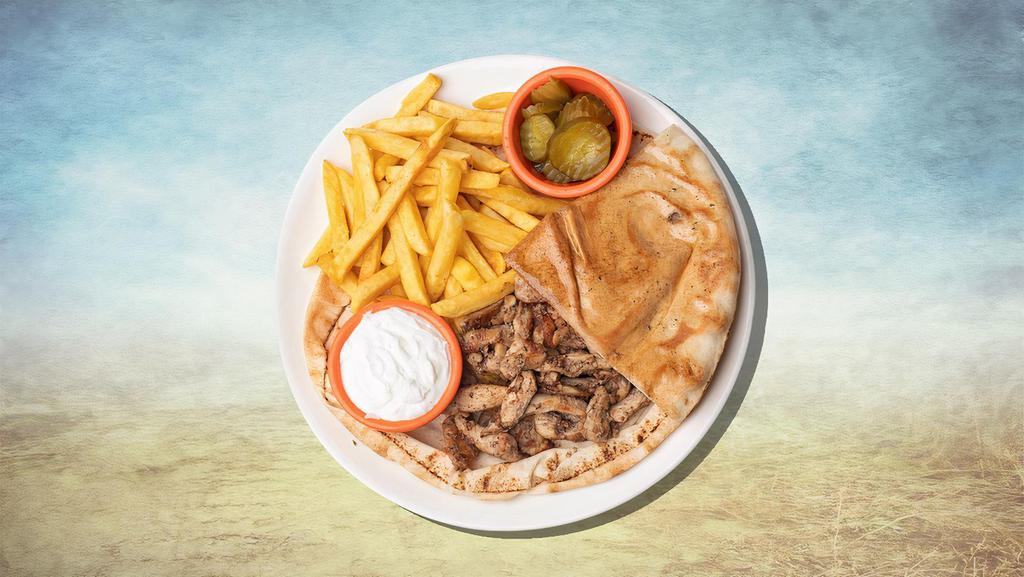 Chicken Shawarma Platter Loco · Classic chicken shawarma with a side salad and fresh pickle.