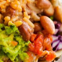 Veggie Burrito · Mexican home made Rice, Pinto Beans, Cheese, Tomato, Onion, Cabbage, Cilantro, Avocado Slice...