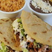 Plt: 2 Gorditas, Rice & Beans · Authentic, family recipe, stuffed corn tortilla. With your choice of meat and beans topped o...