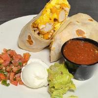 Big Breakfast Burrito · Large Garlic Herb flour tortilla filled with bacon, scrambled eggs, potatoes, cheese and a s...