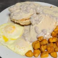 Biscuits And Gravy · Fresh buttermilk biscuits, smothered with sausage country gravy served with 2 eggs cooked to...