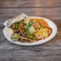 Combo #12* · Fajitas – meat grilled with onions ＆ peppers. Served with sour cream, guacamole ＆ flour tort...