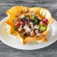 Caramba Chicken Salad* · Large, crispy tortilla bowl filled with iceberg lettuce, red cabbage, carrots, cheese, tomat...