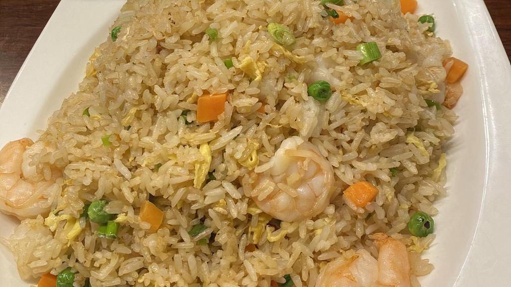 Shrimp Fried Rice · Wok fried rice with, peas, carrots, egg and scallions.