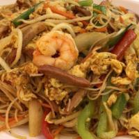 Singapore Rice Noodle · Singapore style curry spiced rice noodle stir fried with bbq. Pork, shrimp, bean sprouts, ca...
