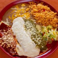 Bandera Enchiladas · 3 soft corn tortillas filled with your choice of chicken, beef or cheese with Spanish rice a...