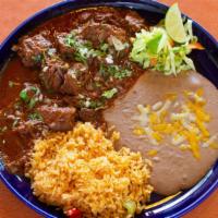 Barbacoa · Slow oven roasted until tender beef chunks marinated with dry chile peppers and traditional ...
