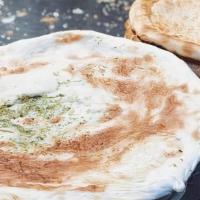Hummusaria · Middle Eastern dip, spread, or savory dish made from cooked, mashed chickpeas blended with t...