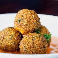 Falafel · ground chickpeas with tahini deep fried