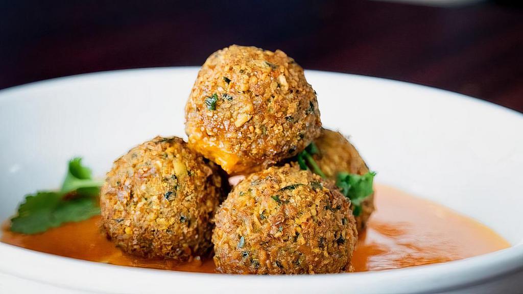 Falafel · ground chickpeas with tahini deep fried