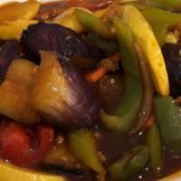 Spicy Bean Eggplant · Gluten free. Medium spicy. Eggplant cooked in spicy soybean coconut milk sauce with onions.