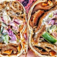 Street Cart Doner Wrap · Garlic aioli, fried lavash chips, romaine, cabbage, tomato, onion, green pepper, cucumber, a...