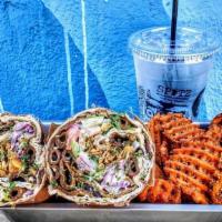 Berliner Doner Wrap Combo Meal · Berliner red sauce, feta, cabbage and carrot slaw, sumac, tomato, onion, cucumber, corn and ...