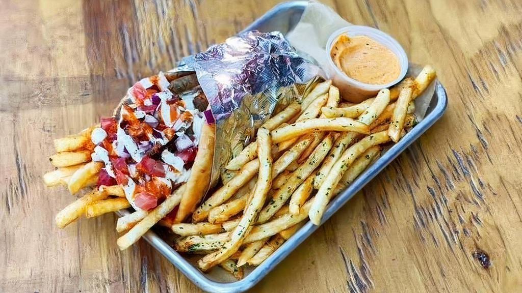 Street Greek Gyro Combo Meal · Choice of protein with zesty feta, berliner sauce, tzatziki, onion, tomato and french fries...all wrapped in a pillowy pita. + A SIDE & DRINK