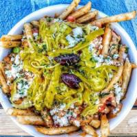 Street Cart Fries · Our famous fries topped with garlic aioli, feta, onion, green pepper, tomato, olives, and pe...