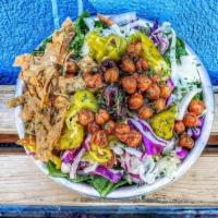 Greek Side Salad · Romaine, onion, green pepper, tomato, cucumber, feta, cabbage, pepperoncini, olives, lavash ...
