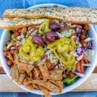Vegan Doner Salad · Romain, cabbage, carrot, onion, green pepper, cucumber, olives, pepperoncinis, tomato, fried...
