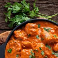 Butter Chicken - Boneless · Chicken breast cooked in onion-tomato sauce and finished with cream and mild Indian spices.