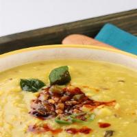 Dal Tadka · Yellow dal cooked with onion, tomato and flavored with generous amount of tempered ghee and ...
