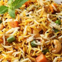 Vegetable Dum Biryani - Family Pack · Potato, carrot, cauliflower and paneer marinated in yogurt and Indian spices and fragrant ba...