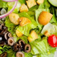 Garden Salad · Spring greens with cucumbers, tomatoes, olives, red onions and croutons. Served with your ch...