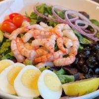 Shrimp Luigi · Spring salad greens, Chilean shrimp, tomato, cucumber, olives, red onion and sliced hard boi...