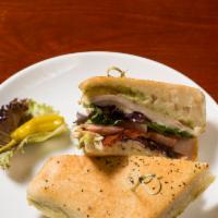 Turkey Pesto Melt · Our sandwich breads are baked fresh in house daily. Smoked turkey, bacon, sweet basil pesto ...