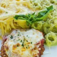 Tour Of Italy · Fettuccine alfredo, Sicilian chicken parmesan and cheese tortellini, topped with our creamy ...