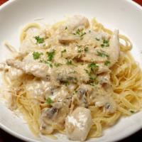 Chicken Fettuccine · Our classic alfredo with sauteed chicken breast and sliced mushrooms. Served over fettuccine...