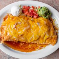 Anahuac'S Supreme Burrito · A rolled flour tortilla filled with your choice of chicken, beef, chile verde or chile color...