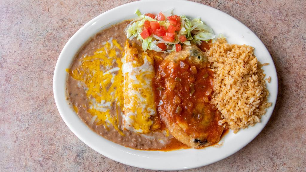 Enchiladas Rancheras · Two enchiladas topped with our ranchera sauce and melted cheese. Served with sour cream and guacamole.