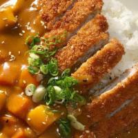 Pork Katsu Curry · Deep-fried pork cutlets, Japanese curry, carrot, potato.
