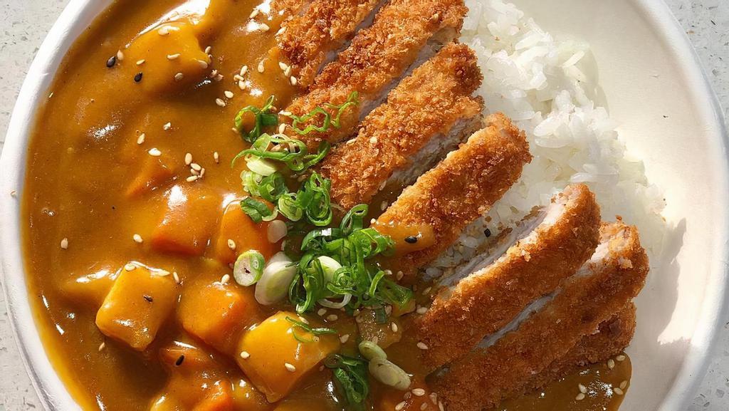 Pork Katsu Curry · Deep-fried pork cutlets, Japanese curry, carrot, potato.