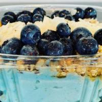 The Big Blue · Banana, pineapple, blue majik, coconut water topped with granola, blueberry, coconut chips, ...