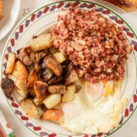 Homemade Corned Beef Hash · Our homemade corned beef hash (NOT! out of a can) served with (3) eggs of your choice. 
Serv...