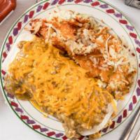 Hasty Burrito · Four scrambled eggs cooked with sausage and onions wrapped in a flour tortilla, smothered in...