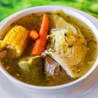 Cocido / Beef Soup · Beef Soup has in it, cabbage, carrot, squash and corn. comes with Rice on the side and corn ...