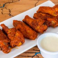 Buffalo Wood Fired Wings · Baked to perfection our wood fire buffalo wings come with your choice of ranch or blue chees...