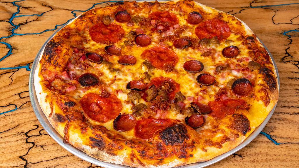 The Black Diamond · In-house red sauce, 3 cheese mountain blend, beef sausage, pepperoni, ham, bacon, garlic, served on our sourdough crust.